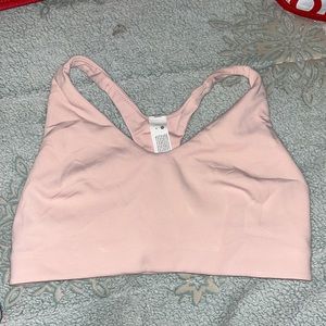 Pink Lululemon sports bra